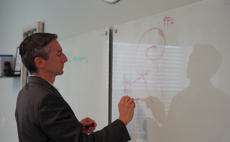 Jeremy Mirabile Creating Diagram on White Board at Recovery Keys