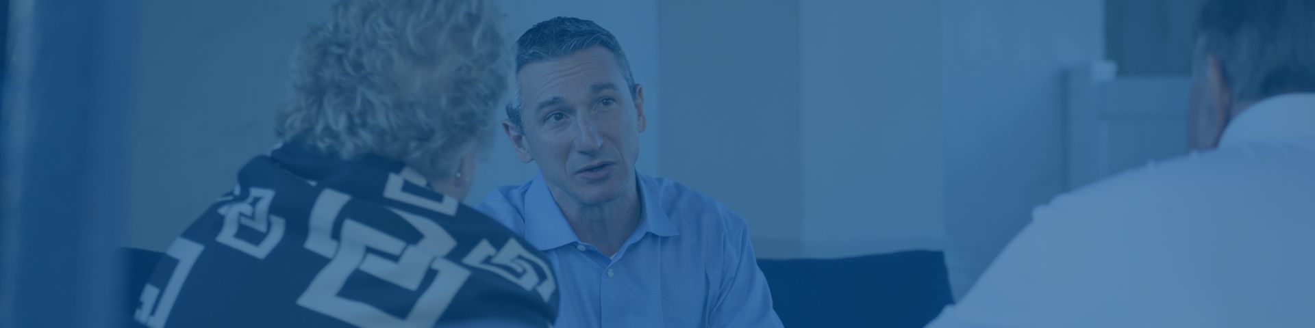 Jeremy Mirabile MD talking to patient